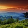 Photo of a beautiful sunset over mountains